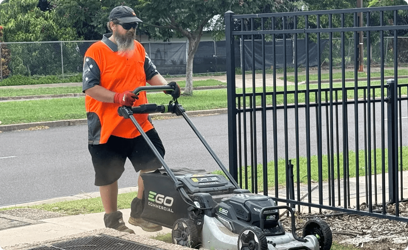 Lawn maintenance with push mower outdoors